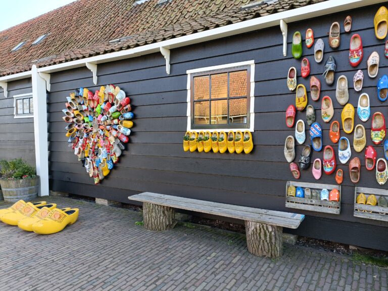 Wall in zaanse schans decorated with dutch clogs